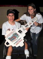 Kristina Urban, the winner of the 2012 HomeAid Houston Project Playhouse, surprises Mikey Moore with the key to the playhouse.